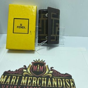 Fendi Zucca 4 Key Holder comes with box.